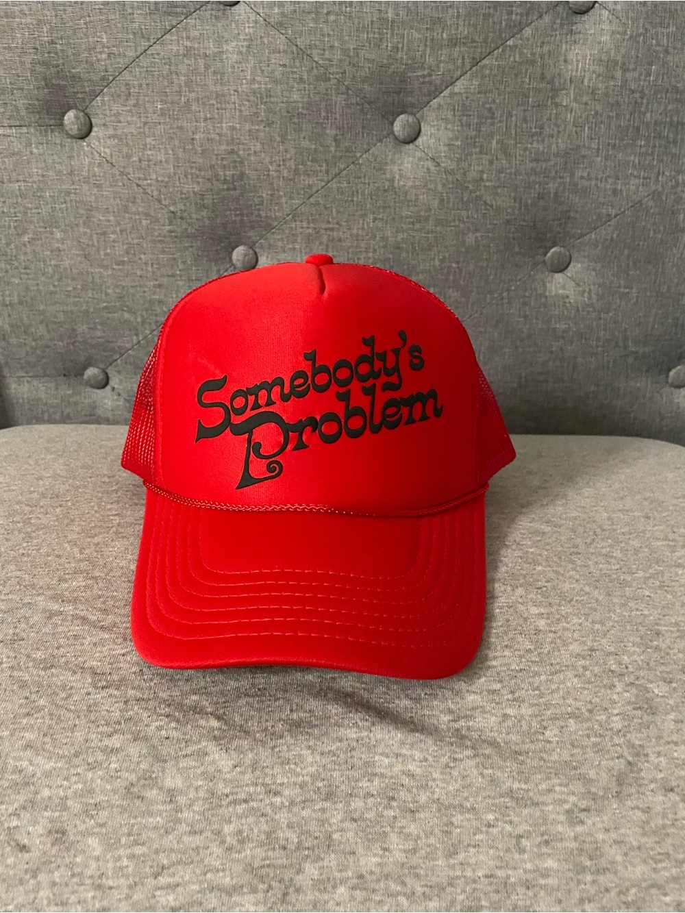 Red 'Somebody's Problem' Trucker Hat